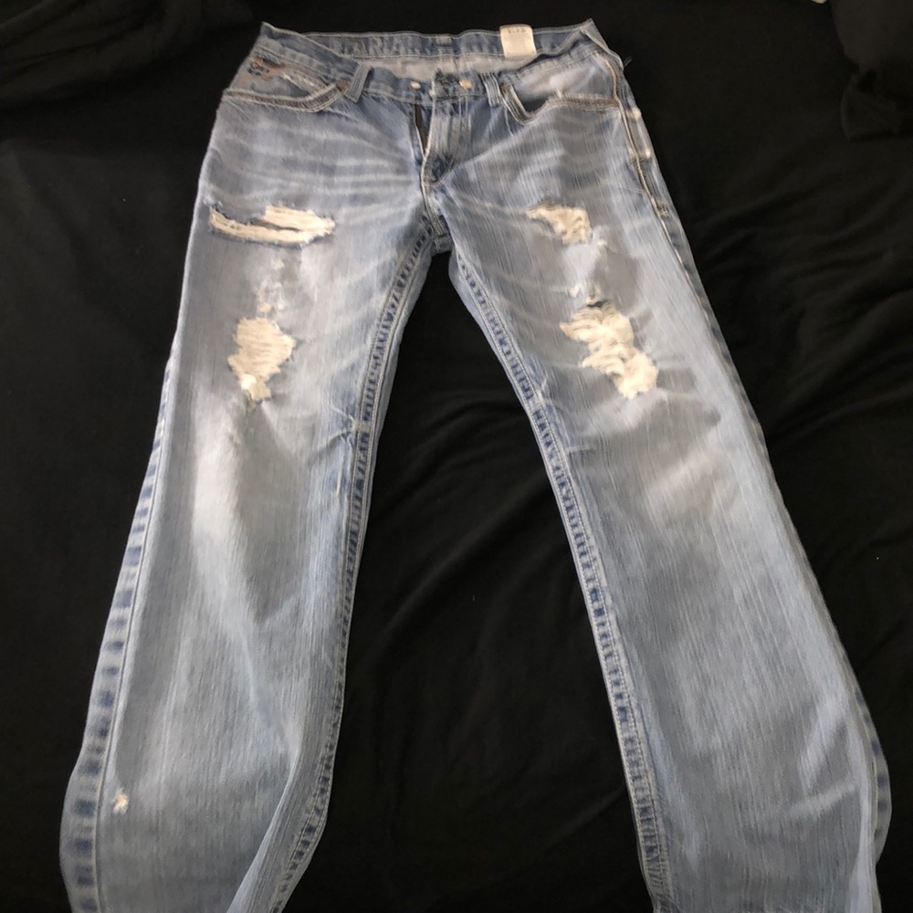 Distressed Ariat Jeans